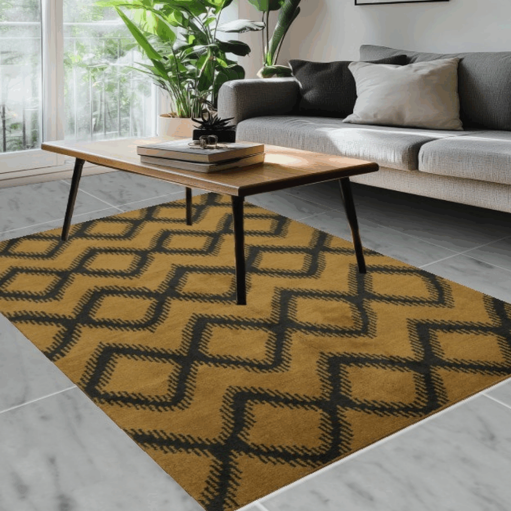 A modern living room with a gray sofa, wooden coffee table, and large plants near a window, featuring a mustard-yellow rug with a geometric pattern. Sunlight fills the space, creating a fresh and inviting feel.
